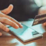 Image of entering credit card info into phone